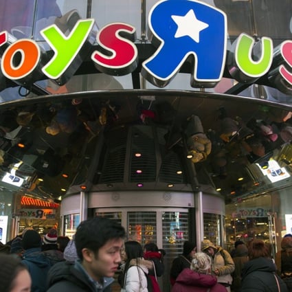 Shoppers line up outside to the Toys 'R' Us store in Times Square, New York in this file photo. Photo: EPA