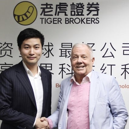 Tiger Brokers’ chief executive, Wu Tianhua (left) and Jim Rogers, chairman and chief executive of Rogers Holdings. Photo: Tiger Brokers
