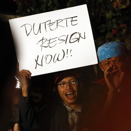 Human rights protesters call for the resignation of Philippine President Rodrigo Duterte. Photo: EPA