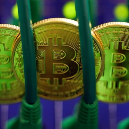 Bitcoins sit among Ethernet cables in this file photo. Despite its crackdown on bitcoin exchanges and initial coin offerings, China remains interested in grasping the underlying blockchain technology and creating its own sovereign digital currency. Photo: Bloomberg