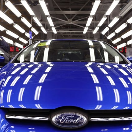 A worker on an assembly line at a Ford plant in Chongqing. Vice-Premier Wang Yang says China needs to shift investment focus to the service sectors, the central and western regions and to high value-added sectors. Photo: Reuters