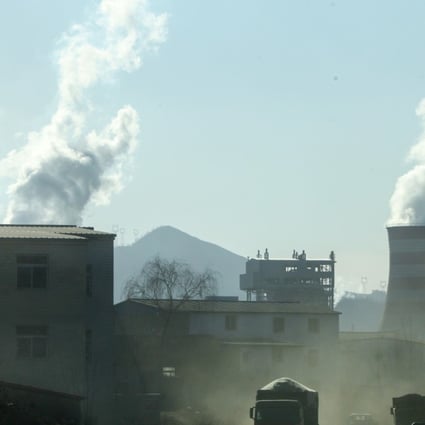 Smoke billows from factories in northern China’s Hebei province. Beijing’s push to reduce pollution could cut economic growth by 0.25 percentage points in the next six months, Paris-based Societe Generale said. Photo: Simon Song