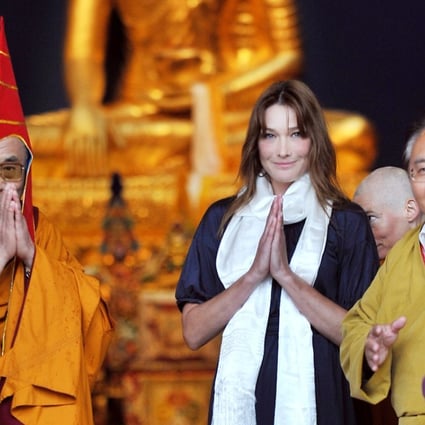 Sogyal Rinpoche (right), the Dalai Lama (left) and France’s then first lady Carla Bruni Sarkozy attend the inauguration of Lerab Ling, in southern France, on August 22, 2008. Picture: AFP