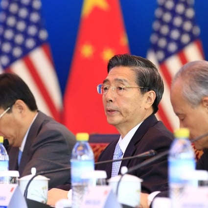 China's Minister of Public Security Guo Shengkun (second from right) has called for greater cooperation between Washington and Beijing on the repatriation of illegal immigrants and fugitives wanted for corruption. Photo: AFP