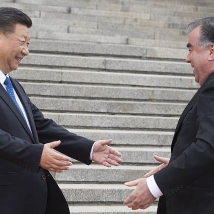 President Xi Jinping (left) greets Tajik President Emomali Rahmon in Beijing in August. Photo: Xinhua