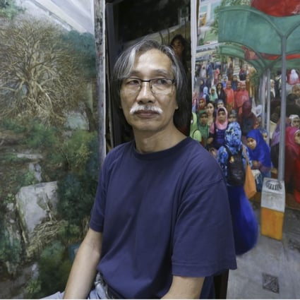 Yeung Tong-lung takes a break from work at his Kennedy Town studio. Photo: Jonathan Wong