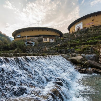 Tulou, or earthen buildings, in the Chuxi Tulou Cluster in Chuxi village, Yongding district, Fujian. The cluster consists of five round earthen buildings and 31 square earth buildings. Photo: AFP