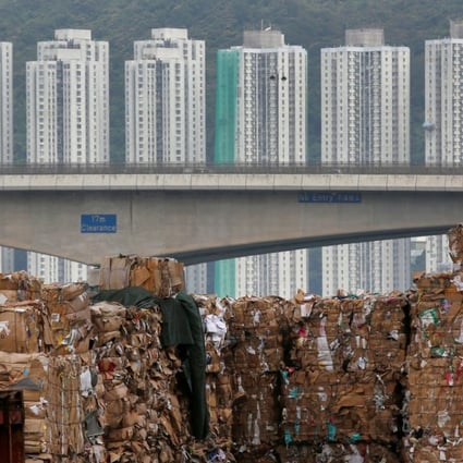 Tonnes of waste paper to be shipped to mainland China is piled up at a dock in Hong Kong, on September 15, after stricter requirements for waste imports into the mainland were announced. Photo: Reuters