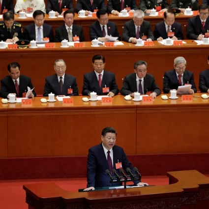 Xi delivers a keynote speech as the party’s general secretary and on behalf of the outgoing Central Committee.Photo: Reuters
