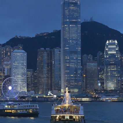 A view of Victoria Peak and Central District from Victoria Harbour at night in July. Hong Kong is a great experiment in a melding of Eastern and Western culture. Photo: AP