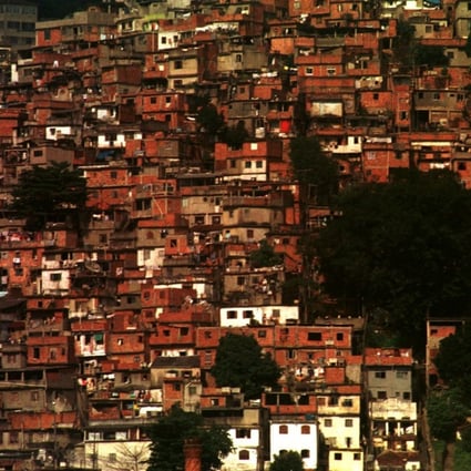 Rio de Janeiro’s average monthly take-home pay of US$640 cannot cover a rental even on the outskirts of town, which could explain why more than one in five Rio residents lived in informal shanty towns called favelas in 2010. Photo: AP