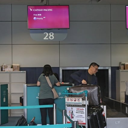 Cathay Pacific is stopping its downtown check-in service at Hong Kong and Kowloon stations for all US-bound travellers from Thursday. Photo: Sam Tsang