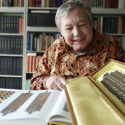 Numismatist Werner Burger with a part of his collection. Picture: Xiaomei Chen