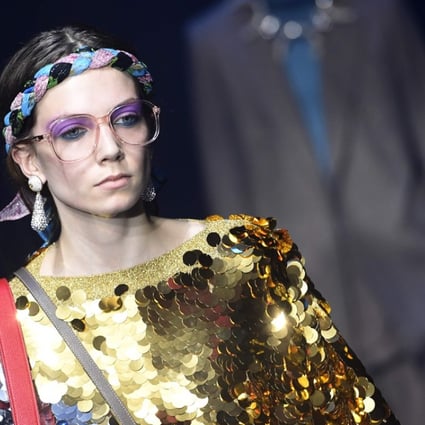 A model presents a creation for fashion house Gucci during Milan fashion week. Photo: AFP