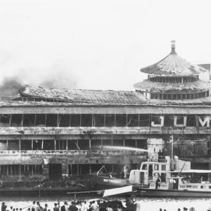 Smoke rises out the Jumbo floating restaurant, in Aberdeen, on October 30, 1971. Pictures: SCMP