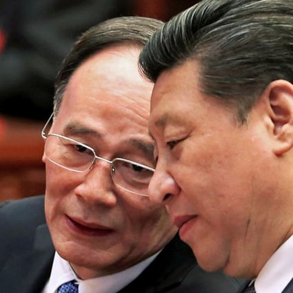 Wang Qishan (left) and President Xi Jinping at the annual meeting of the National People’s Congress in Beijing in March 2015. Photo: Reuters