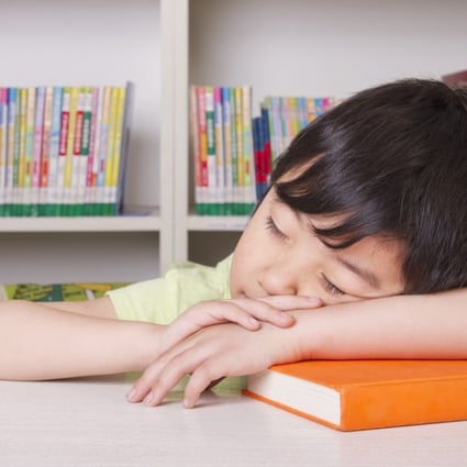 An education authority in eastern China has urged schools to reduce the homework burden they place on overworked pupils. Photo: Corbis