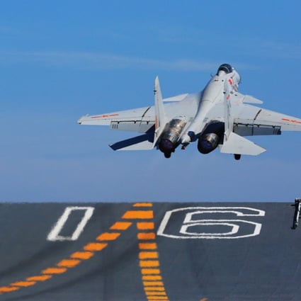 A J-15 fighter jet takes off from the deck of China’s Liaoning aircraft carrier. Improvements to its propulsion system mean the development of a second-generation carrier can now get under way. Photo: Xinhua