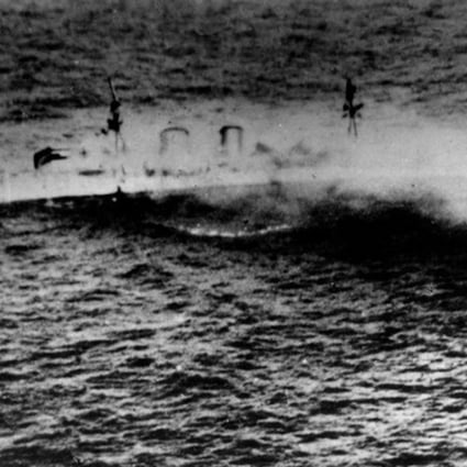 The Royal Navy heavy cruiser HMS Exeter sinking during an operation in the Java Sea on 1 March 1942. The shipwreck has been plundered by scavengers. Photo: US Naval History and Heritage Command