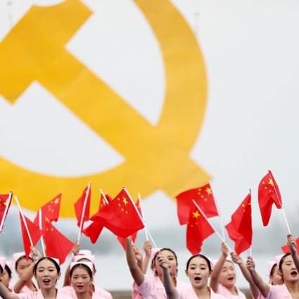 This photo taken on October 13, 2017 shows people performing to welcome the upcoming 19th Party Congress in Huaibei in China's eastern Anhui province. China's Communist Party opens its 19th National Congress on October 18, a twice-a-decade political meeting to reshuffle leadership positions. Photo: AFP
