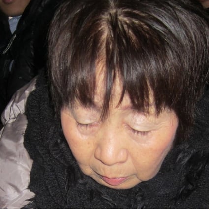 (FILES) This file photo taken on March 13, 2014 shows Japanese woman Chisako Kakehi, who was arrested on suspicion of poisoning her husband with cyanide in the latest “Black Widow” case, arriving at the Kyoto District Court. A one-time millionairess dubbed the “Black Widow” over the untimely deaths of lovers and a husband was sentenced to death on November 7, 2017, in a high-profile murder case that has gripped Japan. / AFP PHOTO / JIJI PRESS / JIJI PRESS / Japan OUT / XGTY