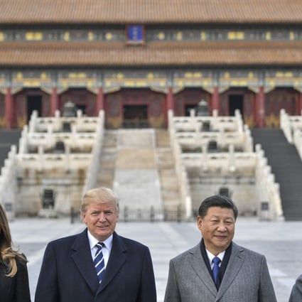 Melania Trump, US President Donald Trump, Chinese President Xi Jinping and his wife Peng Liyuan tour the Forbidden City in Beijing on Wednesday. Photo: AFP