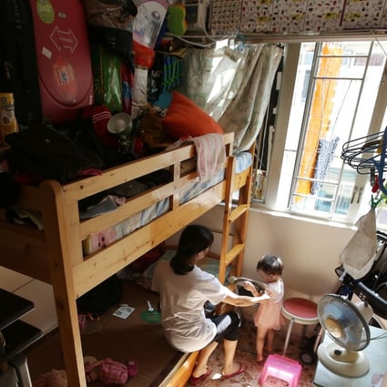 The interior of a subdivided flat in Sham Shui Po. Low-income households in subdivided units often have to endure demeaning living conditions. Photo: Edward Wong