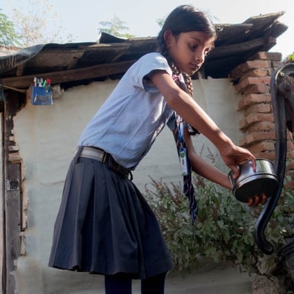 Arti, six, gets ready for school. Her mother, Babita Kumari Yadav, of Potohr village, was married as a young teen and received no education. She hopes that Arti will not marry until after she has finished her studies. Pictures: Abby Seiff