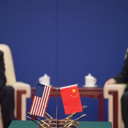 US President Donald Trump (L) and China's President Xi Jinping attend a business leaders event inside the Great Hall of the People in Beijing on November 9, 2017. Photo: Agence France-Presse