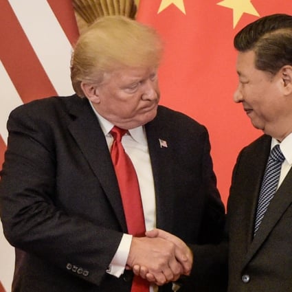 US President Donald Trump shakes hand with President Xi Jinping at a press conference in Beijing. Photo: AFP