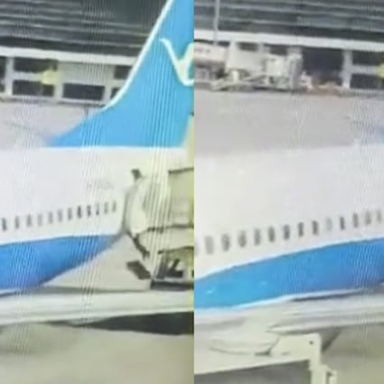The Xiamen Air flight attendant can be seen plunging from the rear door of the Boeing 737 as it was being restocked at Zhengzhou airport. Photo: News.qq.com