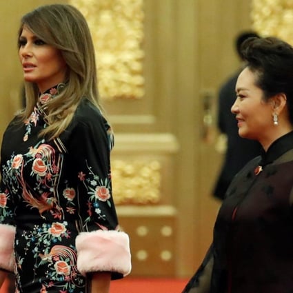 Melania Trump, wife of the US president, and Peng Liyuan, wife of China’s president, arrive for a state dinner at the Great Hall of the People in Beijing on Thursday. Photo: Reuters