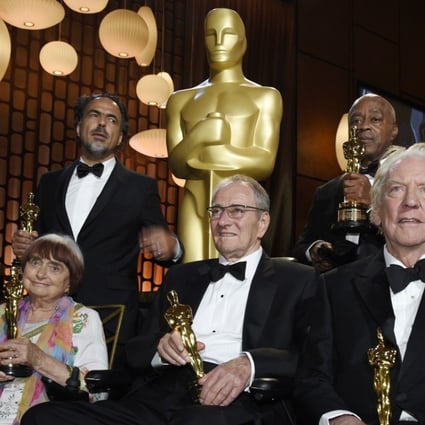 Governors Awards honorees (from left) Agnes Varda, Alejandro Gonzales Inarritu, Owen Roizman, Charles Burnett and Donald Sutherland pose with their Oscars following Saturday’s ceremony in Los Angeles. Photo: Chris Pizzello/Invision/AP