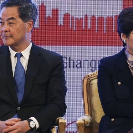 Hong Kong Chief Executive Carrie Lam and her predecessor, Leung Chun-ying, at the World Chinese Economic Summit, in Admiralty on November 13. Photo: David Wong