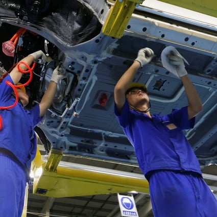 A BYD assembly line in Shenzhen. The company declined to say where in Ontario the new plant will be, or how much it plans to invest in it. Photo: Reuters
