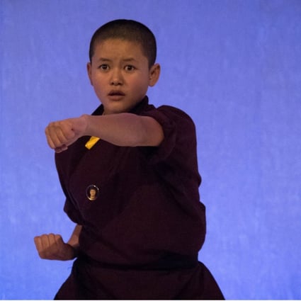Jigme Wangchuk Llhamo, a 19-year-old Buddhist nun, performs at the Trust Conference in London. Photo: Thomson Reuters Foundation