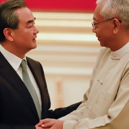 Chinese Foreign Minister Wang Yi (left) meets Myanmese President Htin Kyaw at the Presidential Palace in Naypyitaw, Myanmar, on Sunday. Photo: Reuters