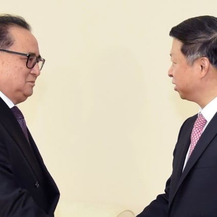 Ri Su-yong (left), vice-chairman of North Korea's ruling party, greets Song Tao, head of China's Communist Party's International Liaison Department, in Pyongyang on Saturday. Photo: Kyodo
