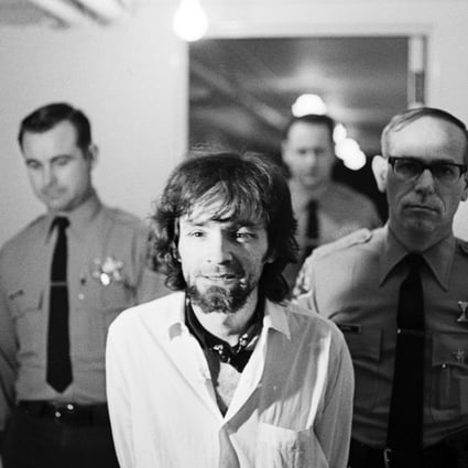 Charles Manson is brought into court in January 1971 to hear the final arguments from the prosecution in the Tate-LaBianca murders in which he and three female defendants were charged with murder. Photo: Corbis