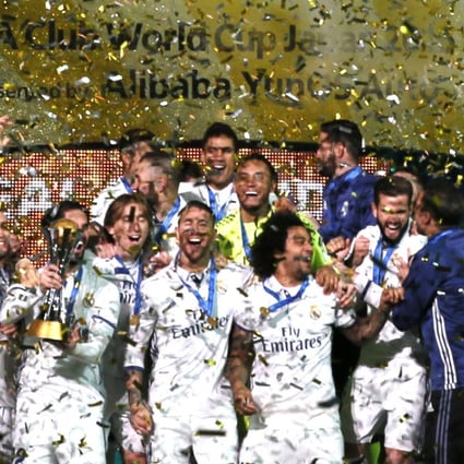 Real Madrid players celebrate on the podium after defeating Kashima Antlers in the final of the 2016 Fifa Club World Cup. Photo: AP