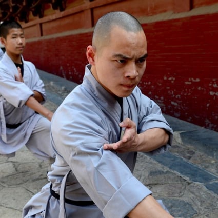 Monks practice Kongfu at Shaolin Temple in Dengfeng, central China's Henan Province. Photo: Xinhua