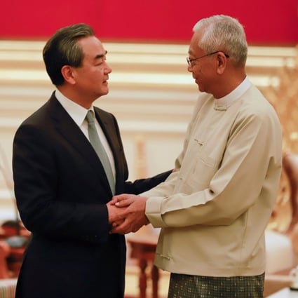 China's Foreign Minister Wang Yi (left) and Myanmar's President Htin Kyaw before a meeting in Naypyidaw last week in Myanmar. Photo: Reuters