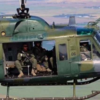A helicopter with a Star Safire III infrared camera mounted on its nose. The camera is manufactured by Oregon-based FLIR Systems Inc. and is used extensively by the US military as a long-range thermal imager and ultra long-range spotter scope. Photo: FLIR Systems