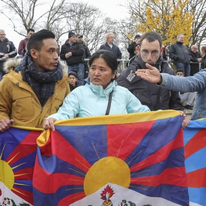Tibetan protester unfurled the flag at a game in Mainz, Germany earlier this month. Photo: EPA-EFE