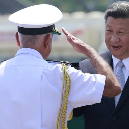 An Indian Navy officer salutes Chinese President Xi Jinping on his arrival in Goa, India, in October 2016 for the BRICS summit. Photo: AP