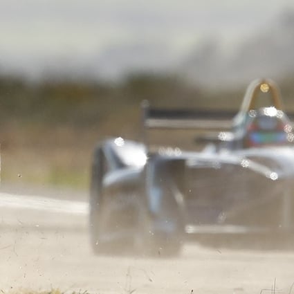 Jean-Eric Vergne prepares for the new Formula E season by racing a cheetah in Western Cape, South Africa. Photos: Nic Bothma/Formula E