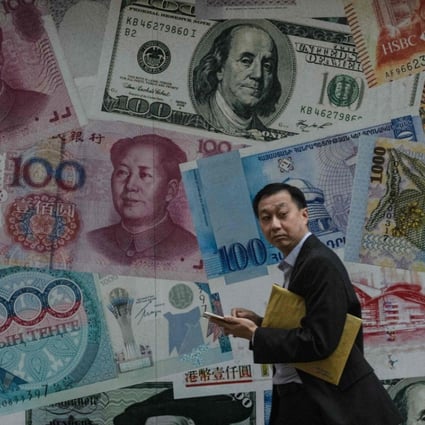 A display in Hong Kong showing different banknotes. Photo: AFP