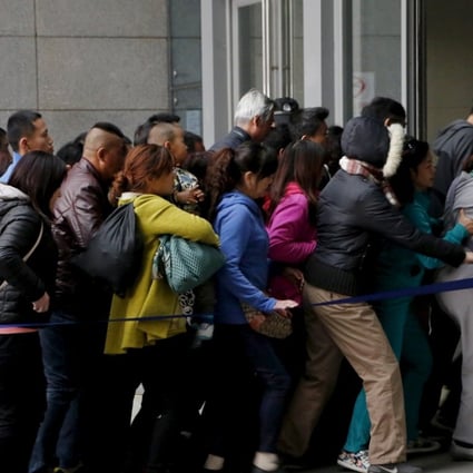 People rush into Peking Union Hospital in Beijing in this photo dated April 6, 2016. Several online health care providers have sprouted in recent years to tackle the problem of China’s overstretched and underfunded hospitals. Photo: Reuters