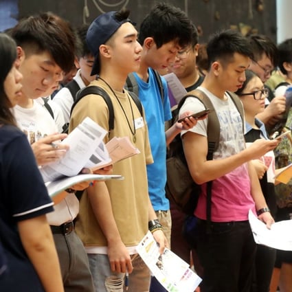 Students register for courses at the Vocational Training Centre's Institute for Vocational Education campus in Cheung Sha Wan. Photo: Edward Wong.