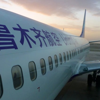 Urumqi Air now says the stewardess filmed the footage and posted it on social media.